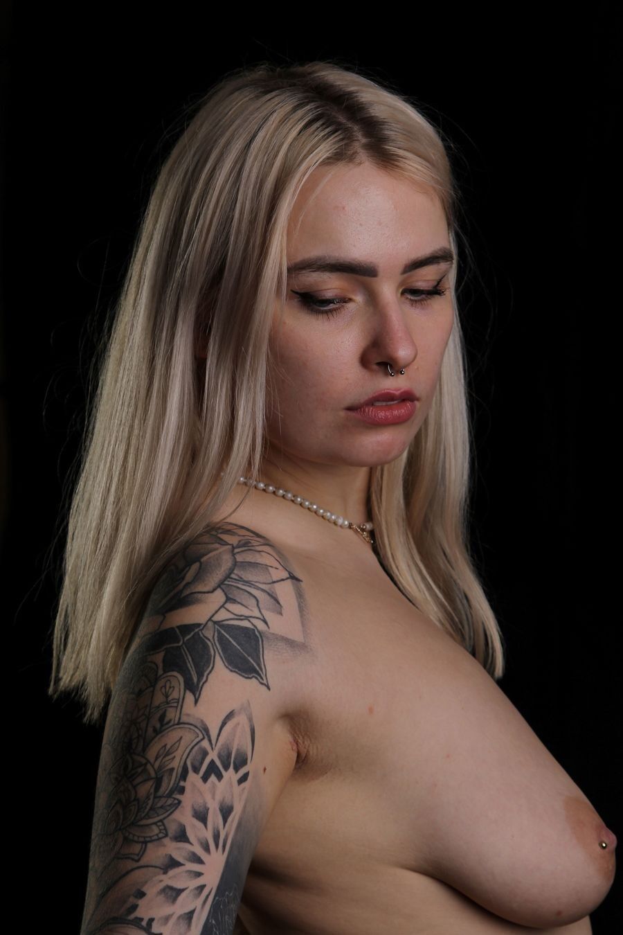 Blonde with pearced Nipples