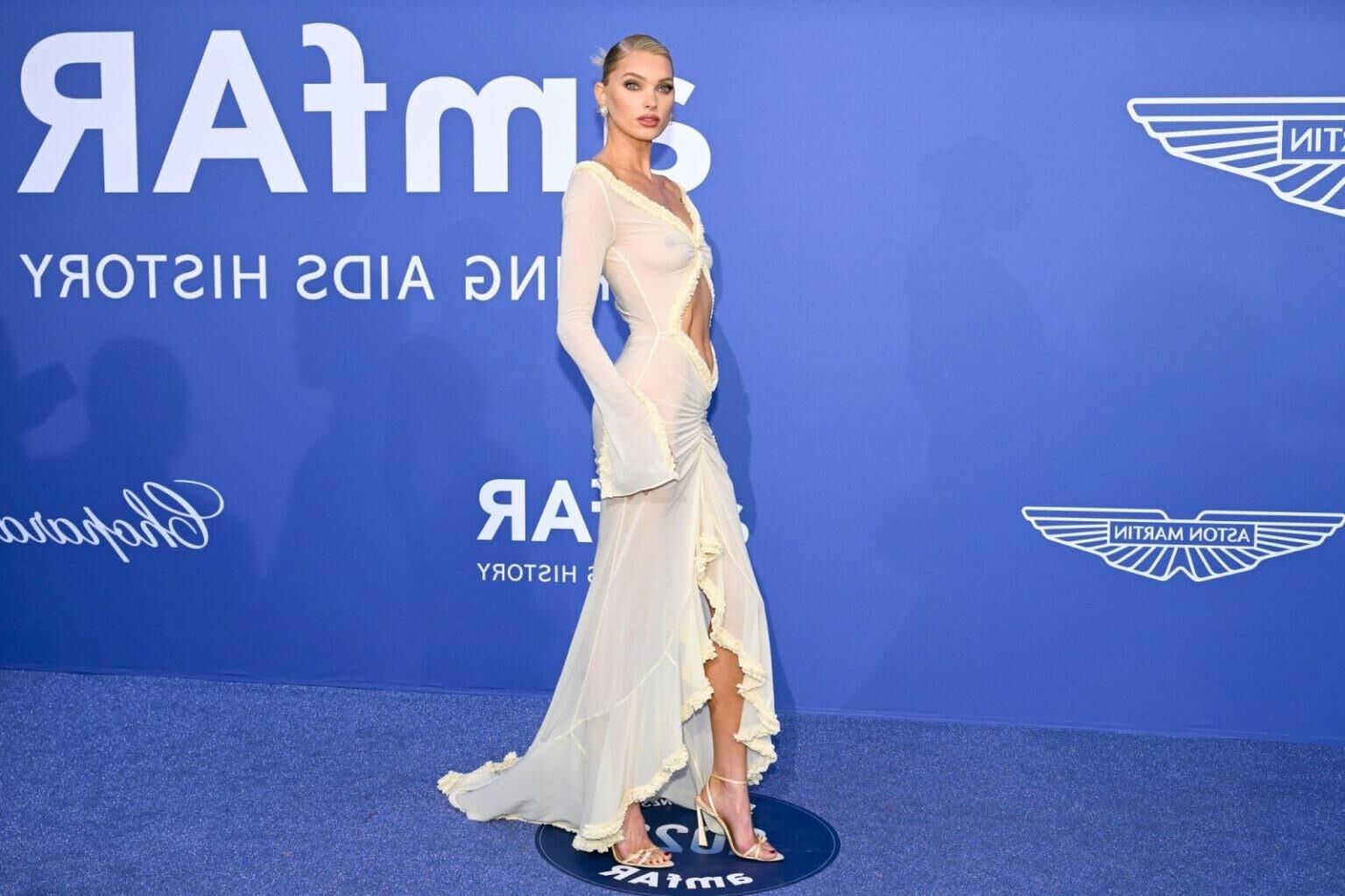 Elsa hosk seins mamelons robe transparente amfar cannes