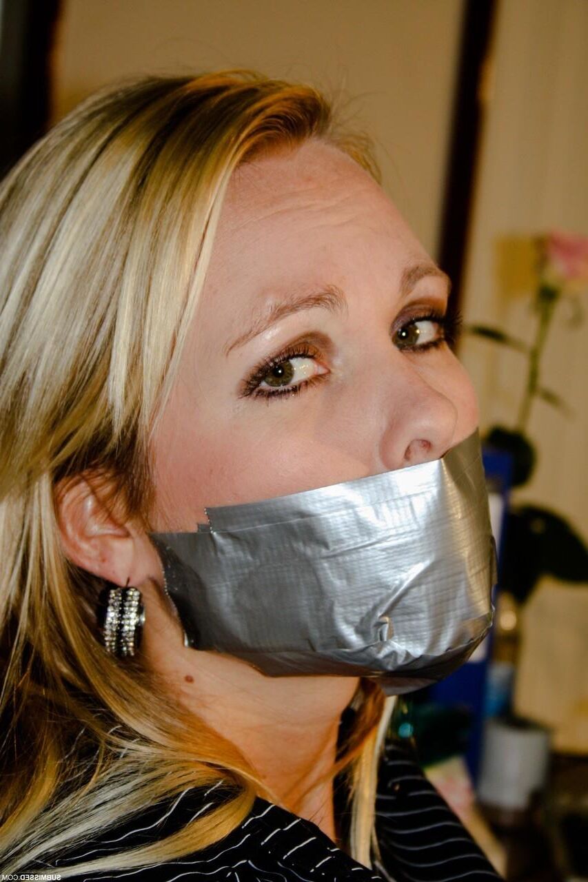 blonde office whore bound and gagged and ready for discipline