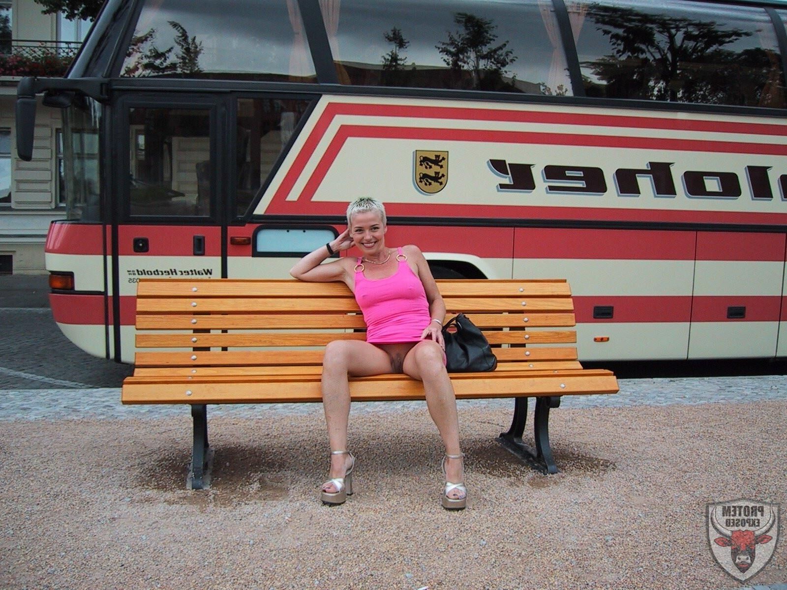 Blonde girl in pink going commando