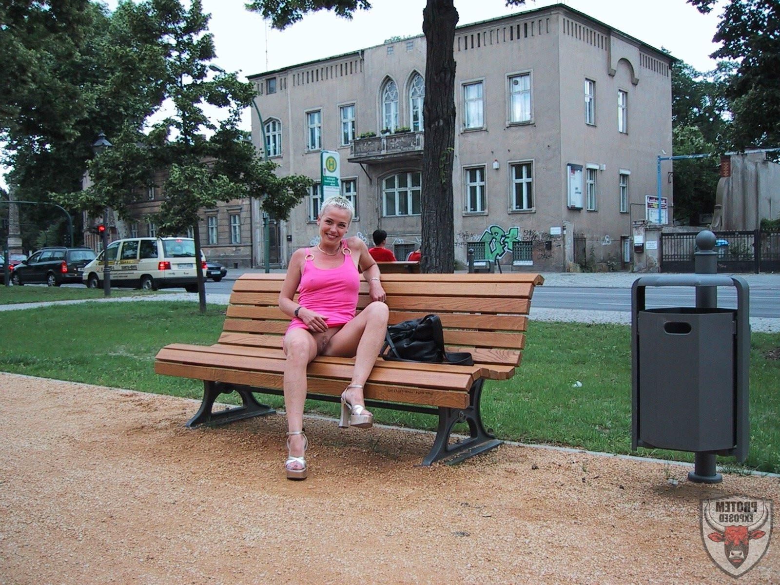 Blonde girl in pink going commando