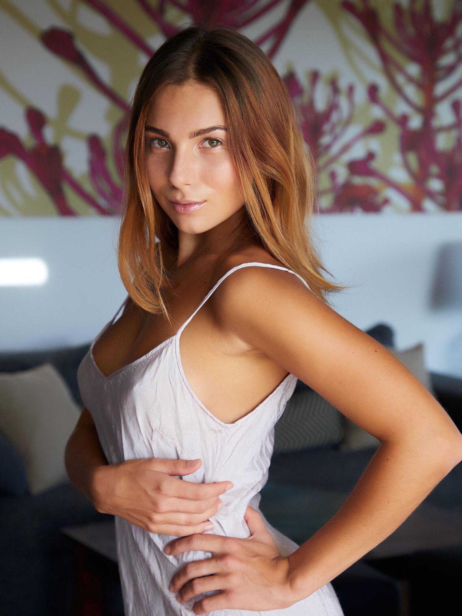 Belka Stripping out of her sexy slip