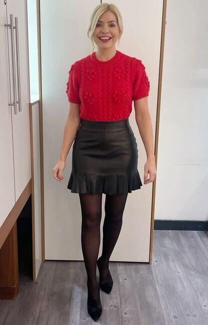 Sexy milf Holly Willoughby in short leather skirt 