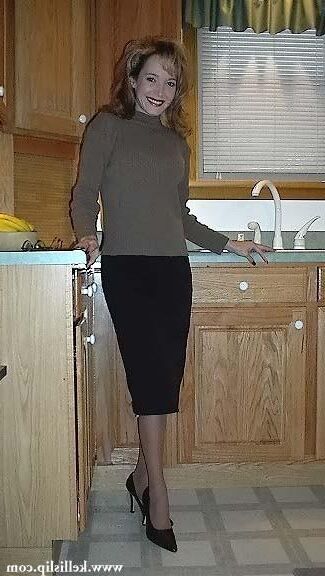 Kelli TH Brown sweater and peach half slip