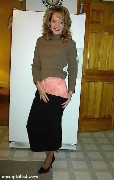 Kelli TH Brown sweater and peach half slip
