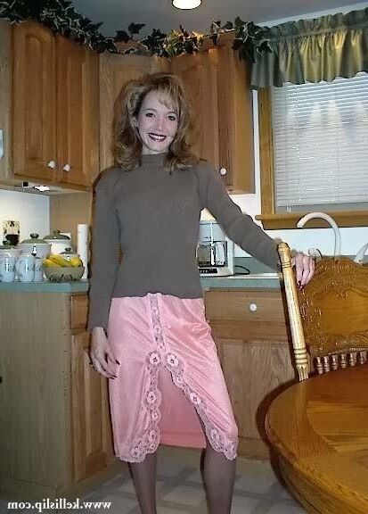 Kelli TH Brown sweater and peach half slip
