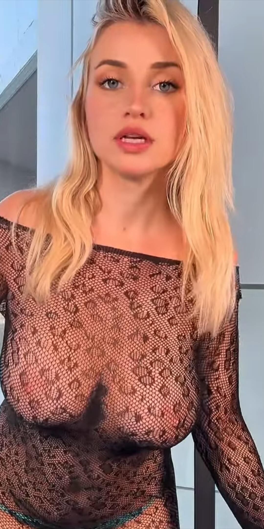 Blonde see through top big tits