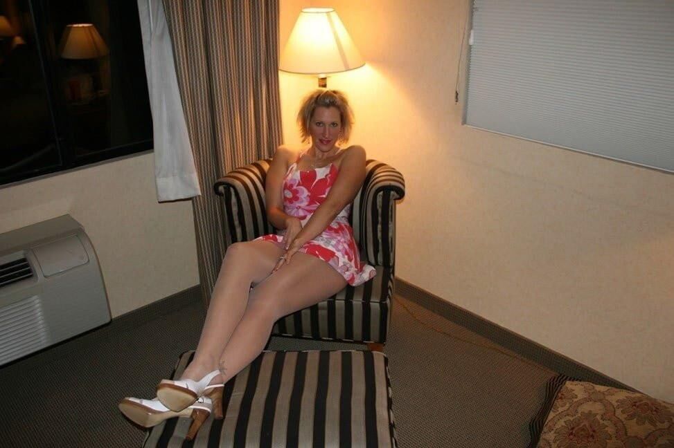 Blonde exhibitionist loves showing off her new tits