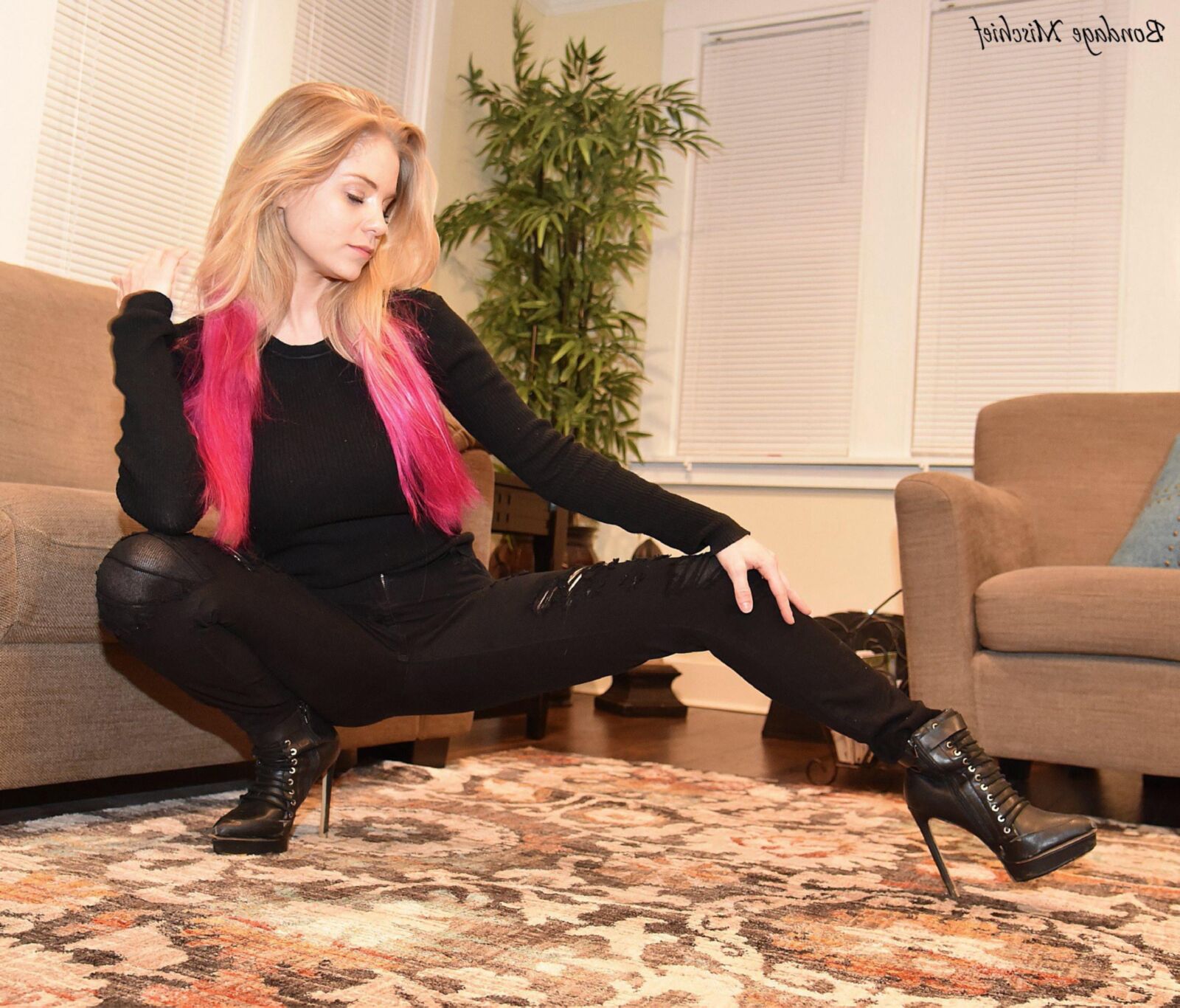 Anabelle Pync Black clothes & Silver tape