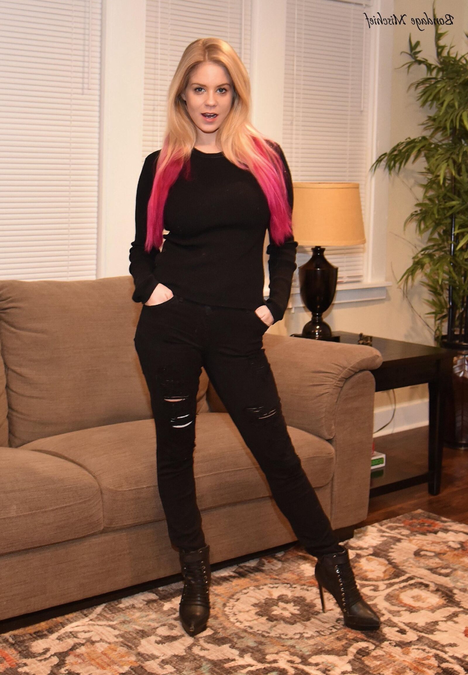 Anabelle Pync Black clothes & Silver tape