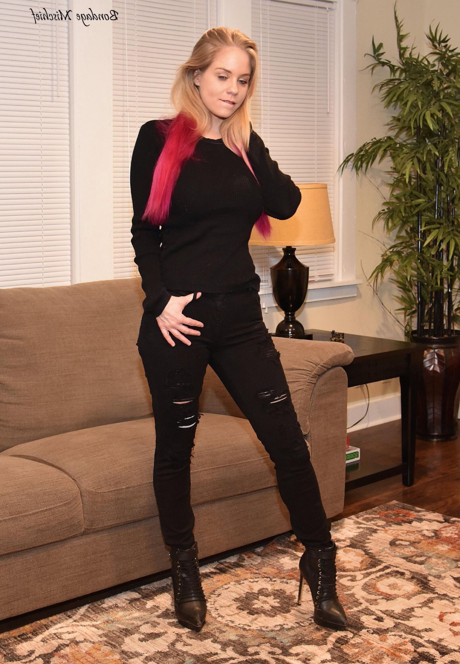 Anabelle Pync Black clothes & Silver tape