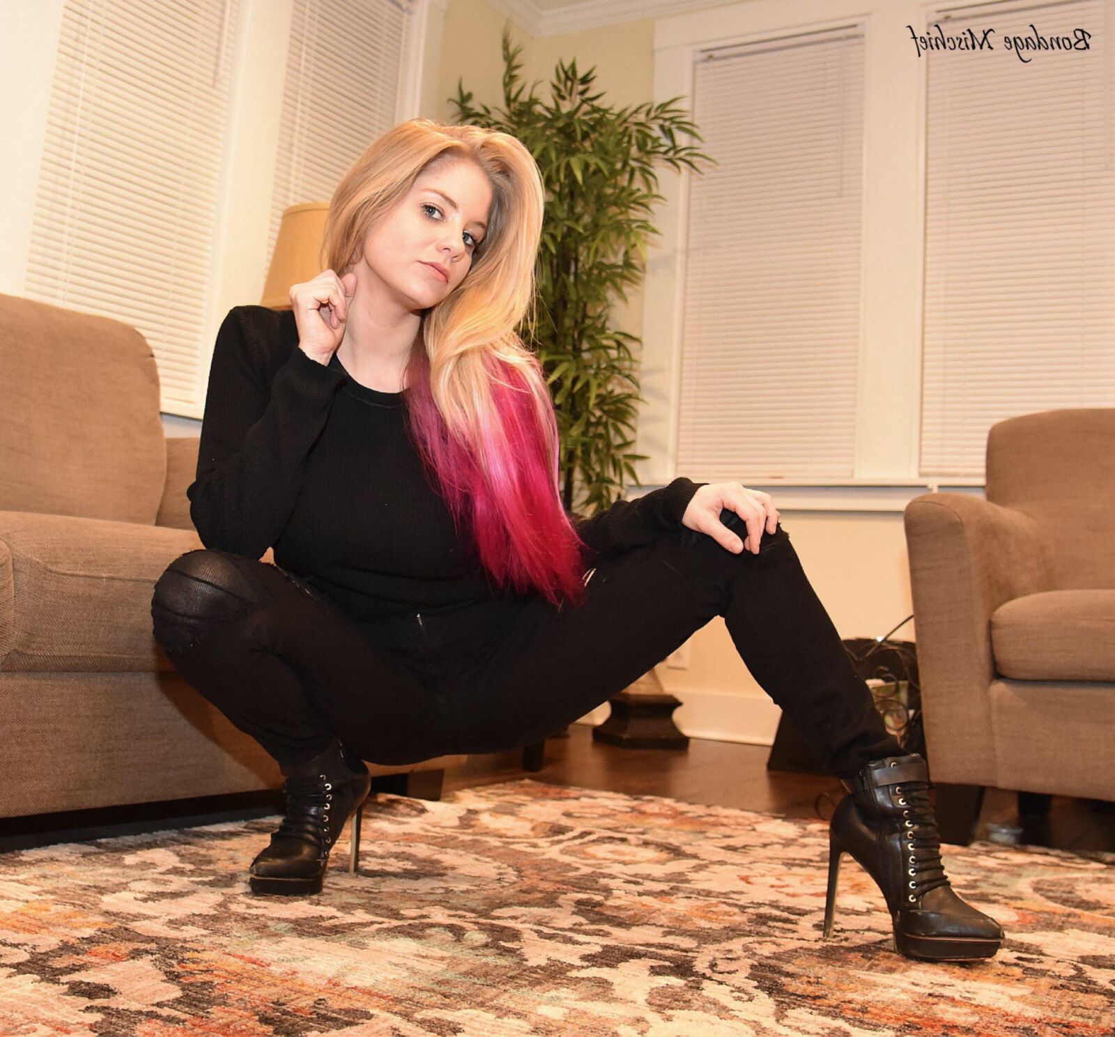 Anabelle Pync Black clothes & Silver tape